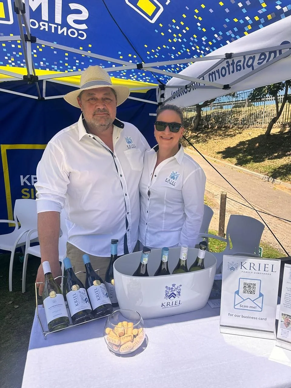 Philip and his wife at a Kriel Family Vineyards market stand